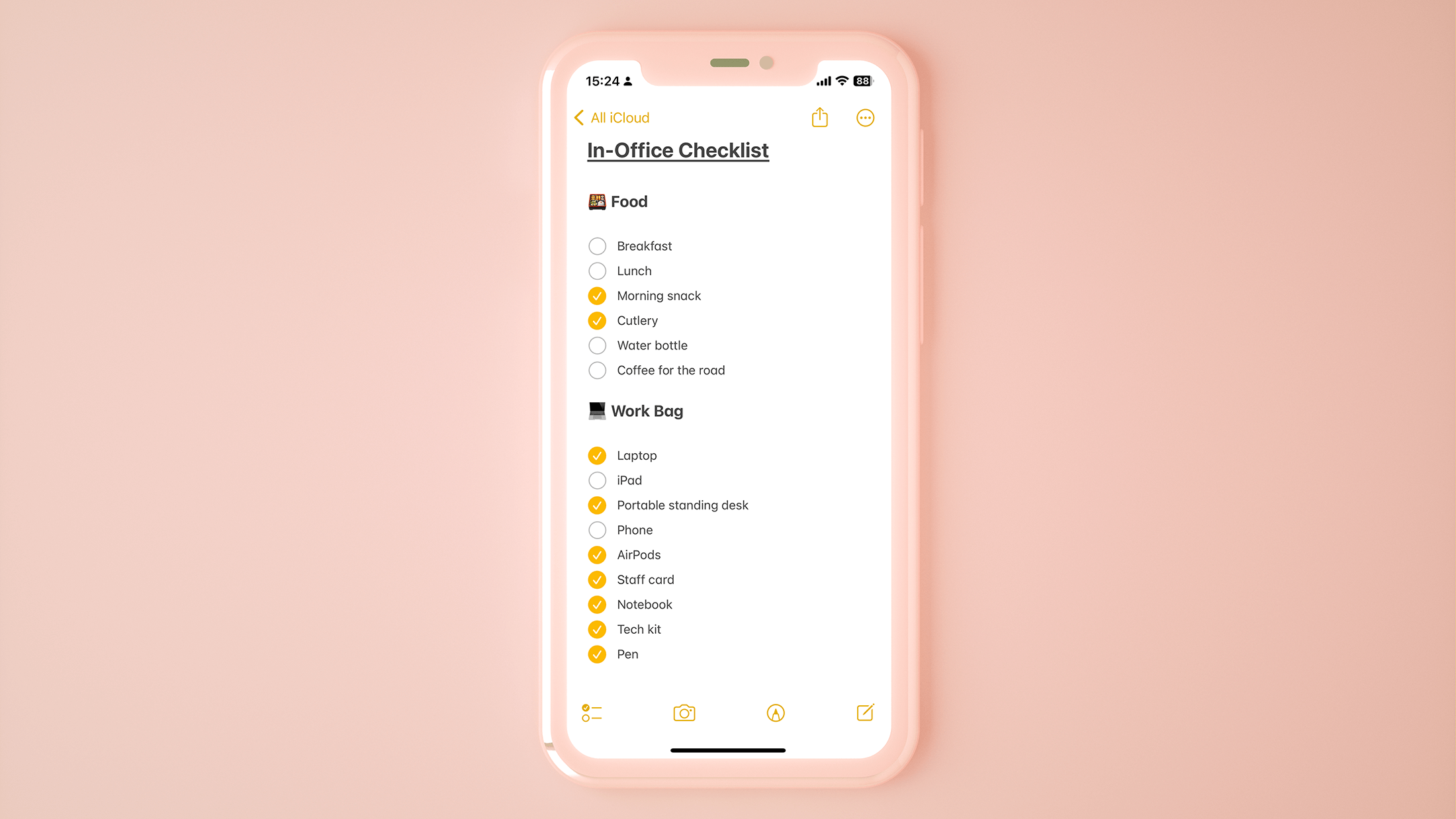 A hybrid work checklist on a phone which includes essential food items and work bag items. These are ticked off as they are packed.